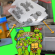 Illustration for article titled Life-Sized Ninja Turtles Pizza Thrower Hits 75 MPH, Shoots Real Pizza